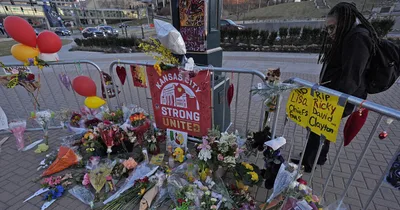 Authorities charge 2 adults with murder in Kansas City parade shooting