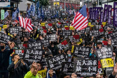 Hong Kong police raid pro-democracy newspaper on ‘the day press freedom died’