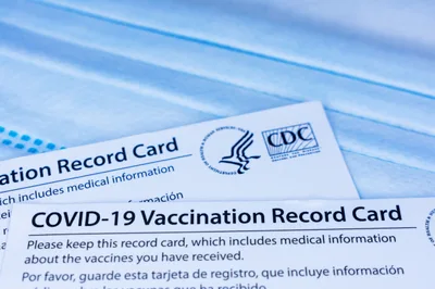 Catholic prep school keeps unvaccinated kids behind plastic barriers at lunch