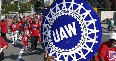 UAW threatens strike against auto giant Stellantis