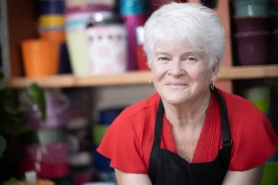 Washington florist who declined to serve same-sex wedding to pay settlement, retire