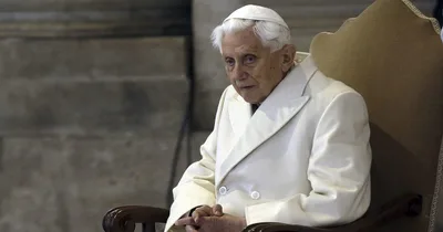 Retired pope apologizes, denies wrongdoing