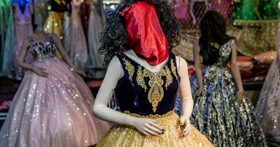 Shopkeepers cover mannequins’ heads under Taliban rule
