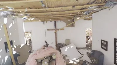 Pastor tearfully recites Bible verse at sight of cross unscathed after tornado rips through church