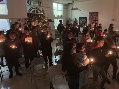 Stuck at the Border, Migrants Find a Little Christmas Cheer