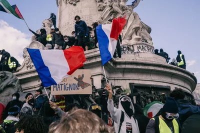 Macron Condemns Those Who 'Sought to Bring Down the Republic' after Rioting Mars Nationwide Protests | CBN