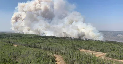 Canadian oil and gas companies pause production as wildfires continue