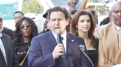 Ron DeSantis Calls Racist Dollar General Shooter ‘major league scumbag’ at Prayer Vigil