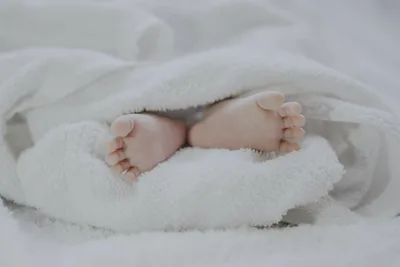 Baby given 1% chance of survival arrives home after mum refuses to abort
