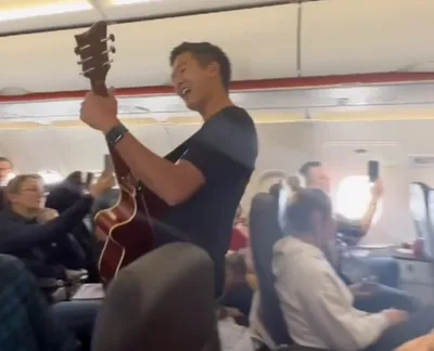 Pastor goes viral with mid-air worship session during flight