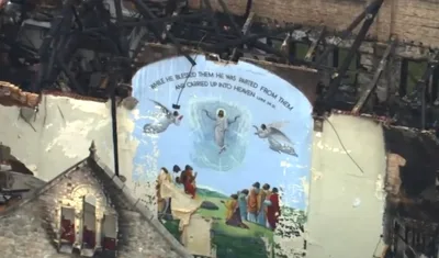 Jesus mural unscathed by fires at historic Chicago church may not survive demolition