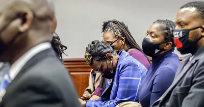 Men convicted in Arbery death given life sentences