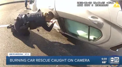 'C'mon Sir…C'mon!': Fearless Cops Risk Lives to Rescue Unconscious Man Trapped in Burning, Overturned Vehicle