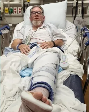 Michigan Abortionist Accused of Running over Pro-Life Activist with Car, Breaking His Leg