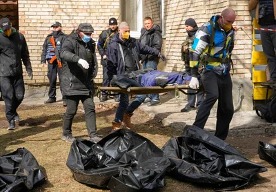 Russian Troops Retreat After Ravaging Communities Near Kyiv, Biden Says Putin Should Be Tried for War Crimes