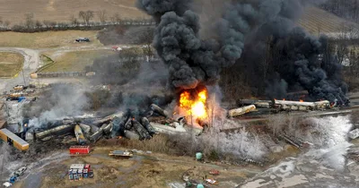 Authorities deal with toxic chemicals after Ohio train derailment
